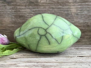 Happy lemon or maybe a lime nature spirit sculpture | Shinto statue, shamanism totem