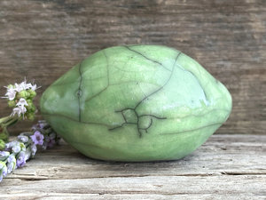 Happy lemon or maybe a lime nature spirit sculpture | Shinto statue, shamanism totem