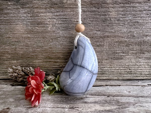 Thumbstone worry pendant w/ sandalwood (light blue) on eco flax cord
