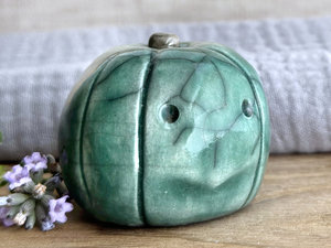 Concerned and significant pumpkin guardian spirit sculpture for Halloween, Samhain, autumn, fall