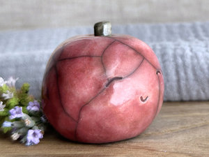 Happy apple guardian spirit sculpture for Halloween, Samhain, autumn, fall