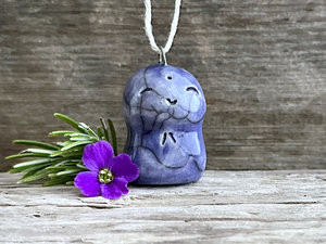 raku ceramic smiley Jizo pendant, glazed in indigo violet and strung on adjustable eco hemp cord.