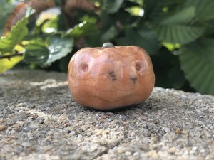 Raku ceramic orange pumpkin nature spirit kami sculpture for autumn, fall, Hallowe'en, and Samhain. Lovely statue for seasonal decorations, nature table, or pagan altar.