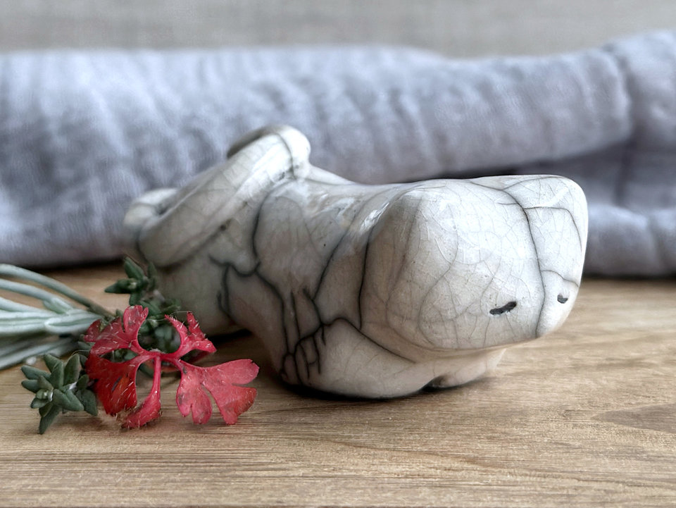 Sleepy white cat kami sculpture | cute guardian for Shinto, shamanism