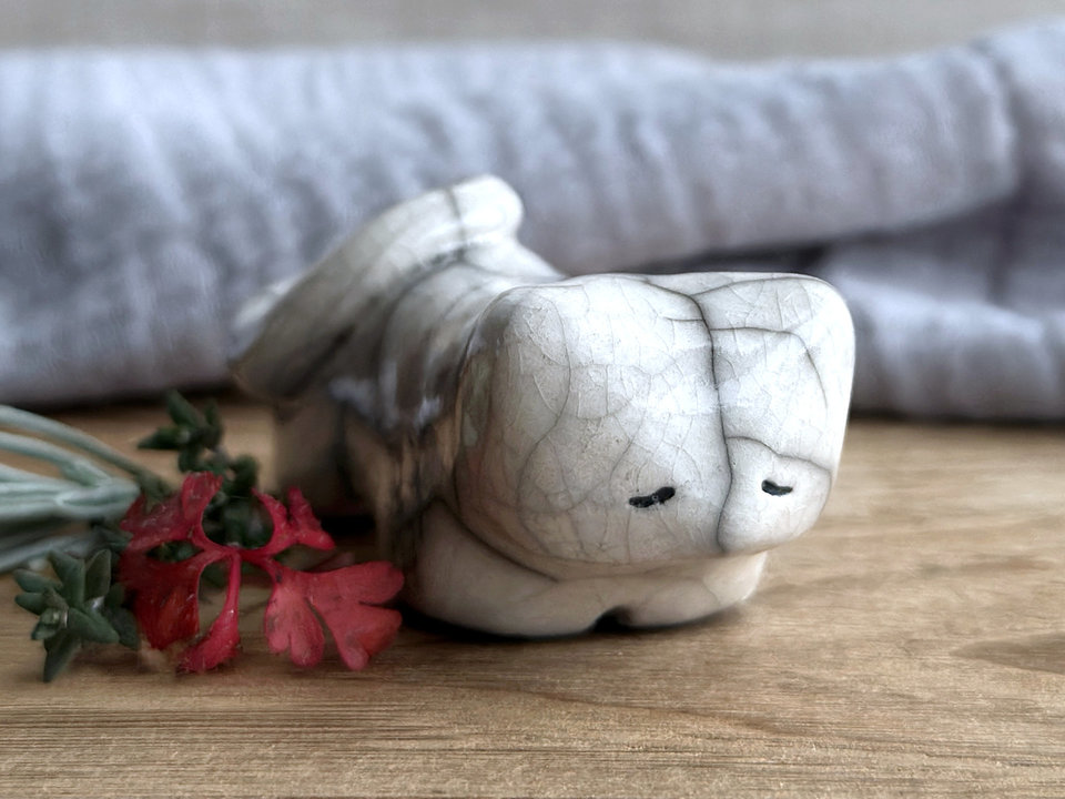 Little raku ceramic cat spirit kami sculpture glazed in white and with a kind, gentle face.