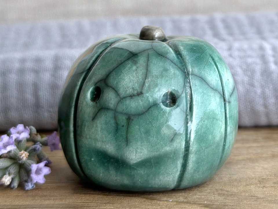Concerned and significant pumpkin guardian spirit sculpture for Halloween, Samhain, autumn, fall