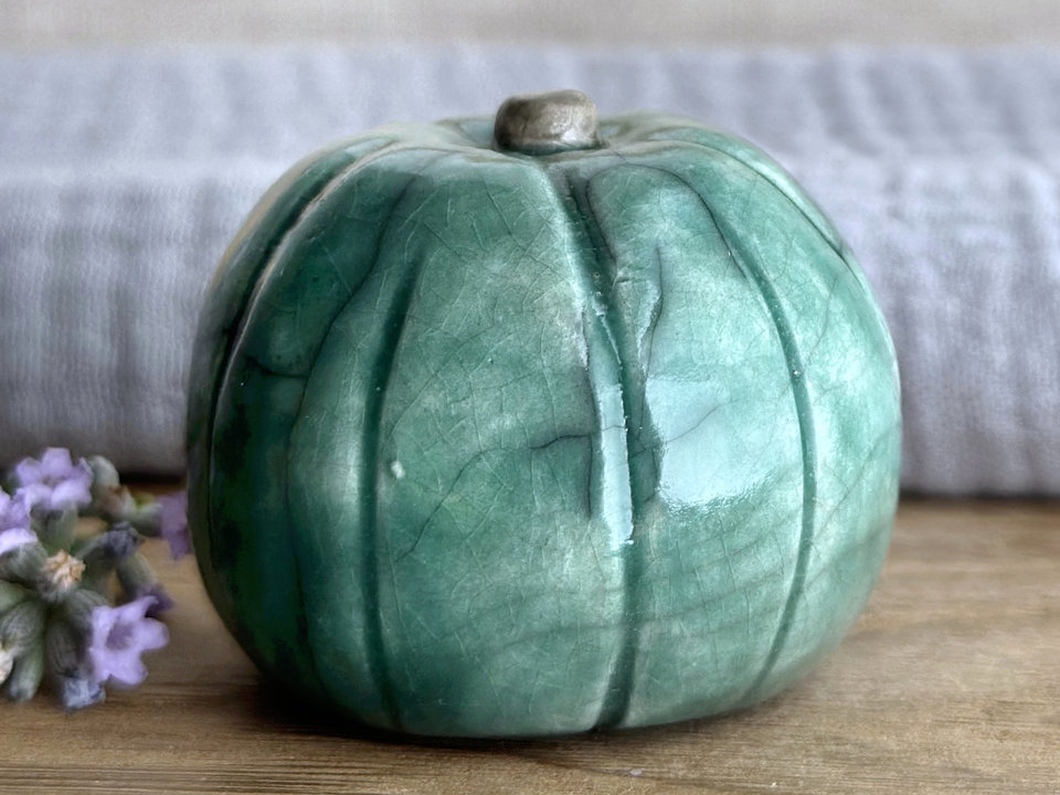 Concerned and significant pumpkin guardian spirit sculpture for Halloween, Samhain, autumn, fall