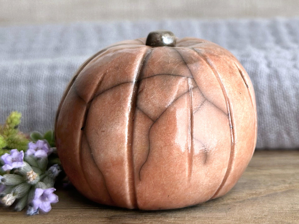 Happy rustic pumpkin guardian spirit sculpture for Halloween, Samhain, autumn, fall