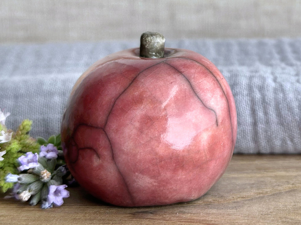 Happy apple guardian spirit sculpture for Halloween, Samhain, autumn, fall