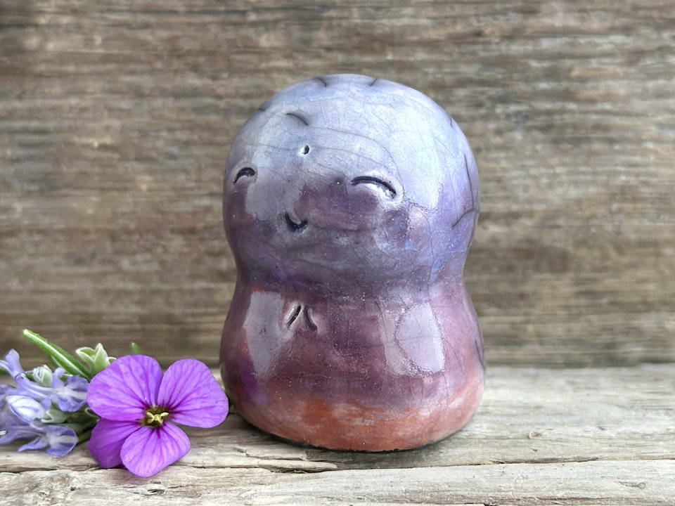 Quiet sunset Jizo hugs guardian statue | Shinto kamidana shrine friend