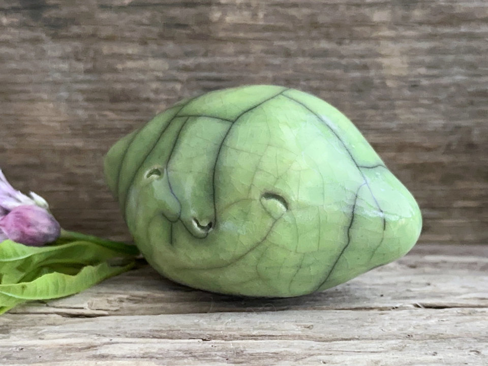 Happy lemon or maybe a lime nature spirit sculpture | Shinto statue, shamanism totem