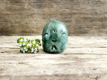Pocket-sized tiny Jizo ceramic raku Shinto statue sculpture glazed in forest green. Very smiley, happy, and loving for a shrine or kamidana.